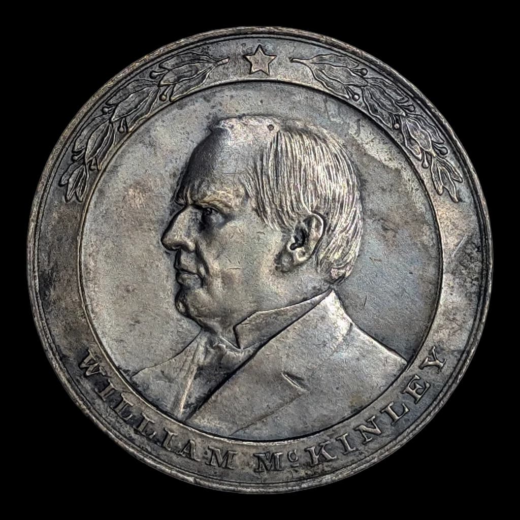 The same medal cut out on white and squared