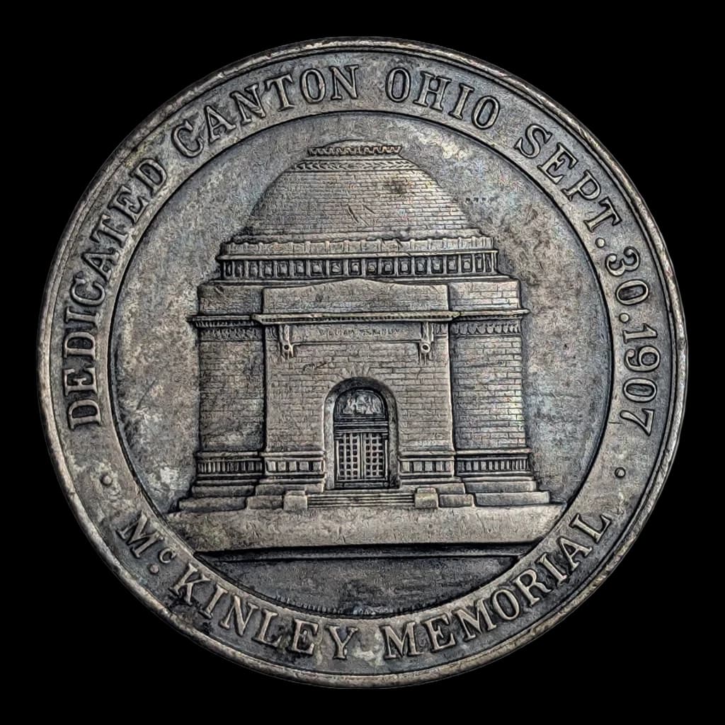 The same medal cut out on white and squared