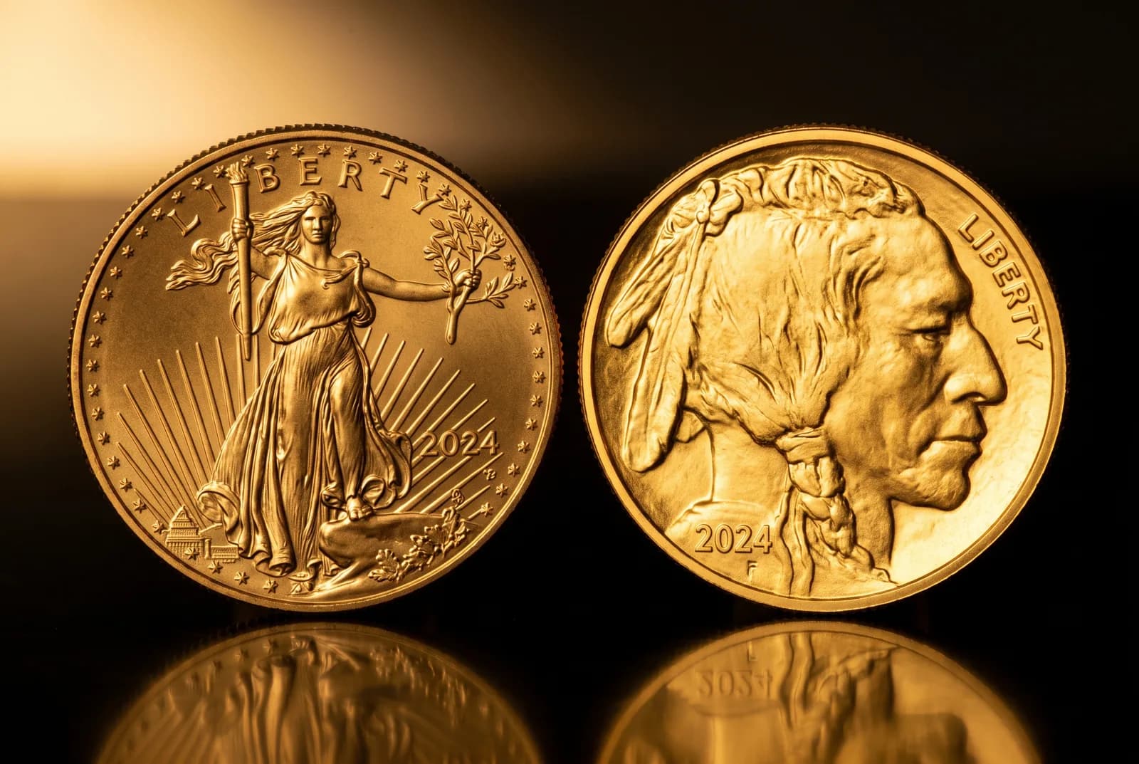 A one-ounce American Gold Eagle and a Gold Buffalo coin side by side