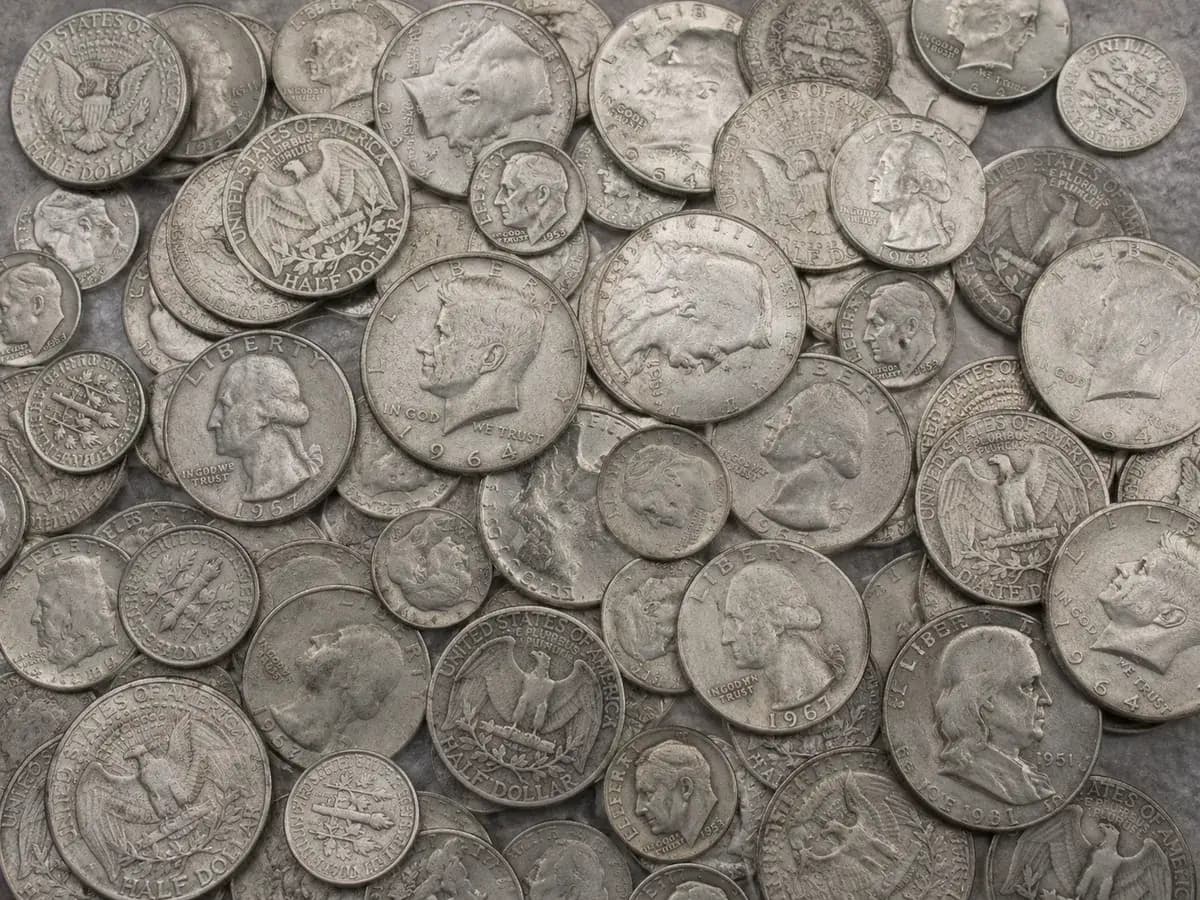 A pile of 90 percent silver US dimes, quarters and half dollars