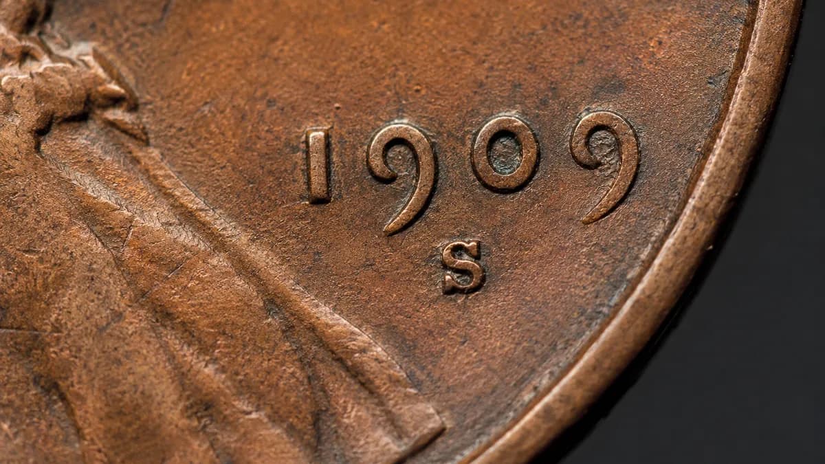 Close-up of a U.S. coin showing its date and mint mark